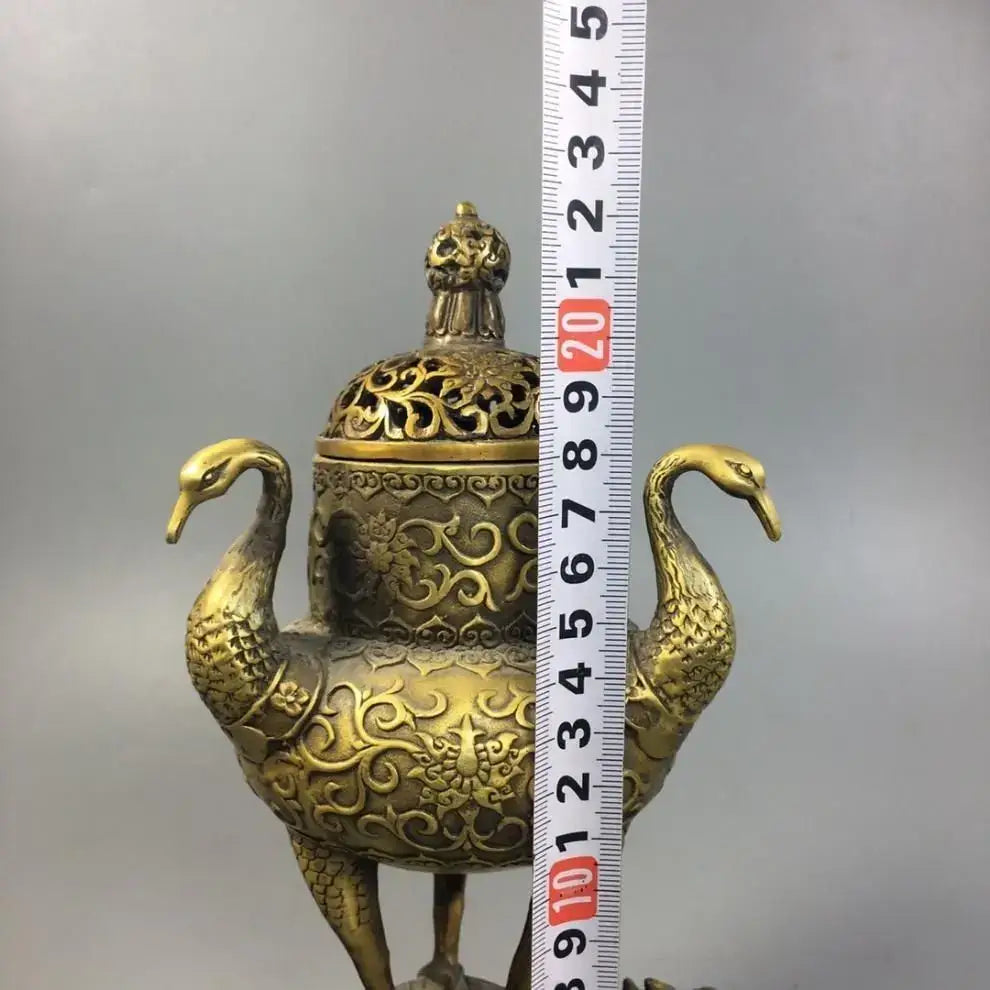 Ornate golden brass incense burner with swan handles and floral scrollwork for decorbites dragon tortoise living room decor