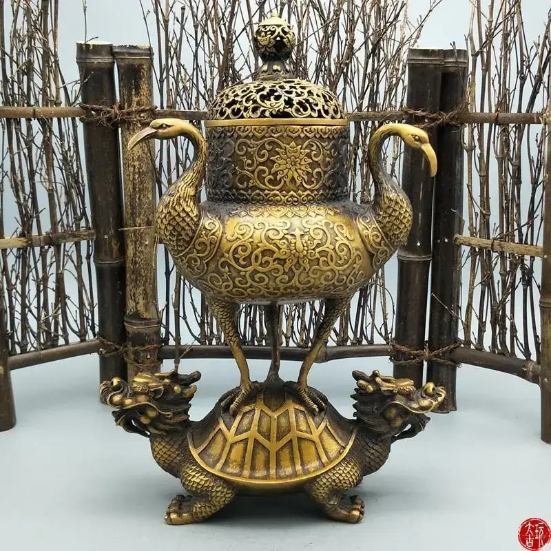 Ornate golden incense burner featuring a phoenix with floral patterns on a decorbites dragon tortoise base for living room decor