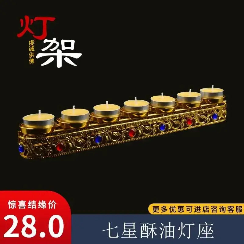 Ornate golden gem inlaid candlestick stand with seven tealight cups and red blue gemstones for wedding altar decor