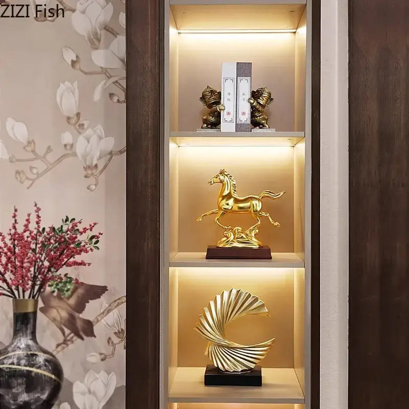 Ornate golden horse mascot resin statue in dynamic running pose crafted from polished metallic material on wooden base