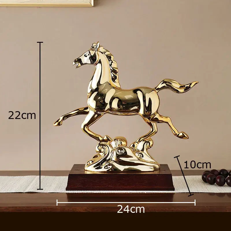 Ornate golden horse mascot resin statue with polished metallic surface on decorative base for living room decor