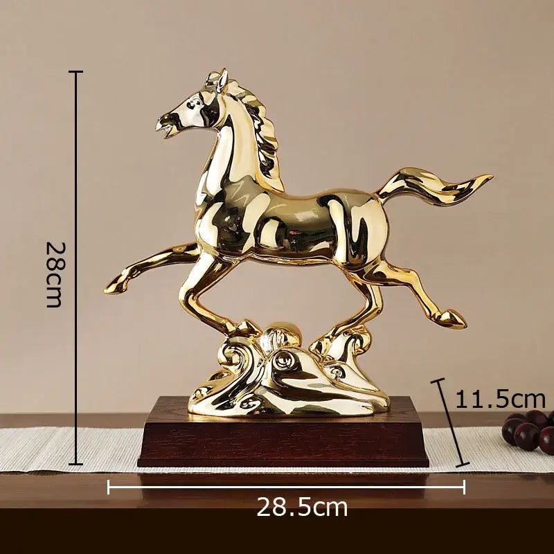 Golden horse mascot resin statue with flowing mane on ornate base for living room decor displayed on wooden pedestal