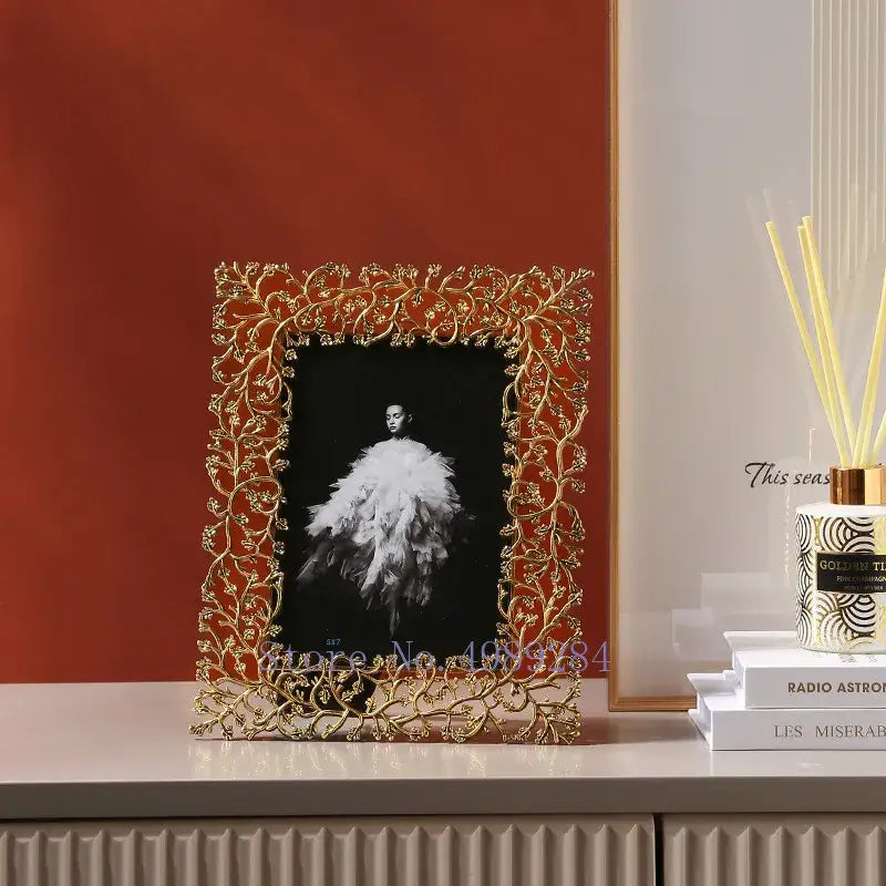Ornate golden leaves metal photo frame with intricate vine and leaf detailing for living room decorbites golden leaves decor