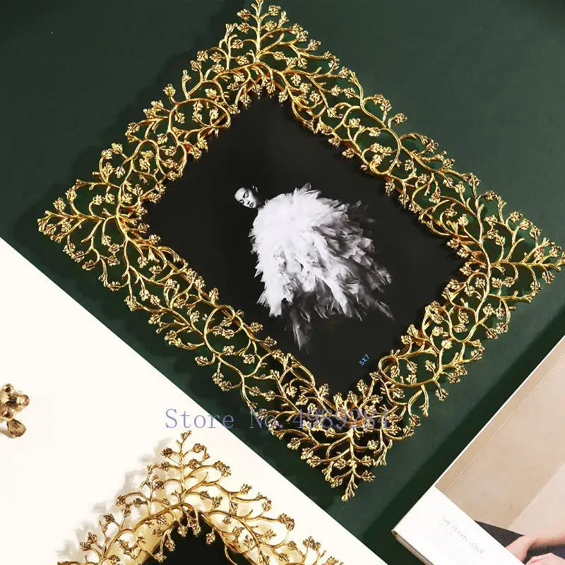 Ornate golden leaves metal photo frame with intricate vine and leaf detailing for living room decor by decorbites