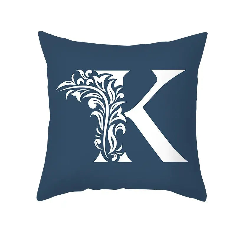Navy blue throw pillow with a large white ornate letter k floral design decorbites blue letter pillowcase for living room