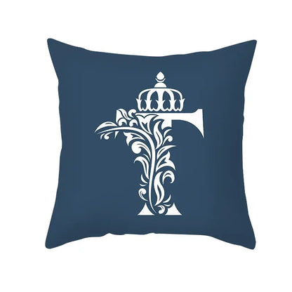 Ornate navy blue letter pillowcase featuring a white letter t with crown and floral detailing for decorbites blue decor