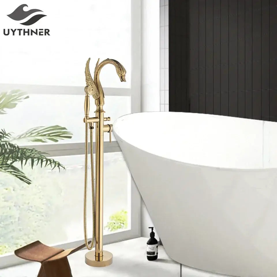 Ornate swan gold bathtub faucet with flexible shower hose and intricate detailing for elegant bathroom decorbites black bathtub