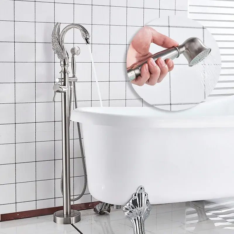 Stylish chrome-finished ornate swan bathtub faucet with matching handheld showerhead for black bathtub decorbites
