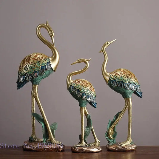 Ornate teal and gold crane bird sculpture with intricate feather patterns for living room decor by decorbites