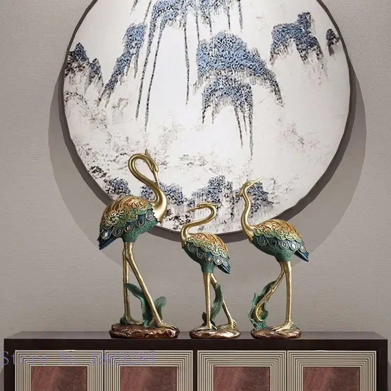 Ornate teal and gold crane bird sculpture with intricate feather detailing for living room decor by DecorBites crane bird