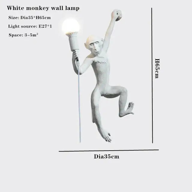 Ornate white monkeys pendant chandelier featuring a matte white resin monkey wall lamp holding an illuminated torch for decor