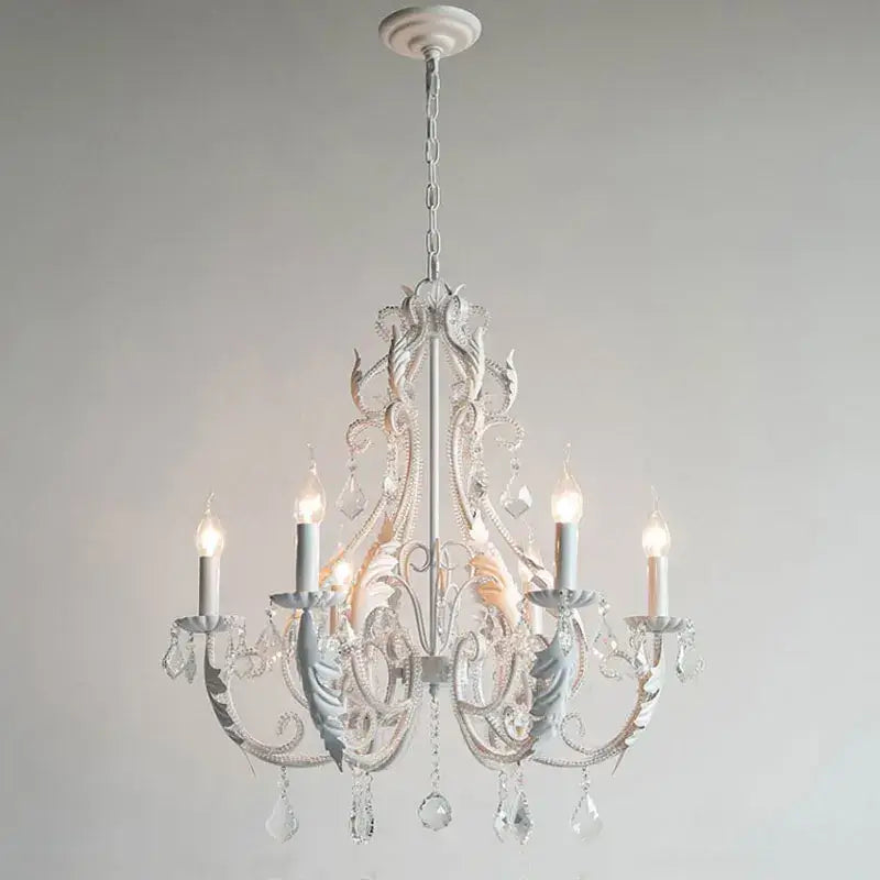 Delicate white decorbites iron crystal chandelier with ornate metalwork and dangling crystals for living room decor