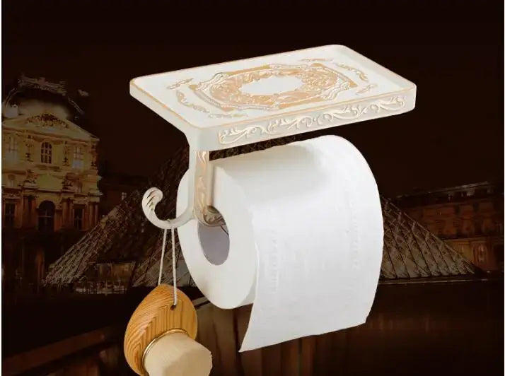 Ornate white and gold toilet paper holder with decorative rectangular top from decorbites bath hardware set