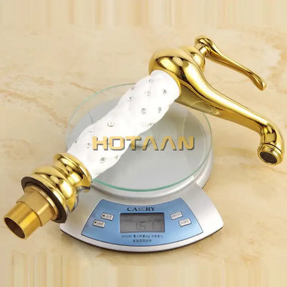 Ornate white and gold brass basin faucet with a diamond-embellished handle for decorbites basin bathroom sink tap