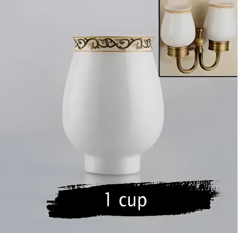 Ornate white ceramic double cup holder with gold decorative band for bathroom toothbrush storage