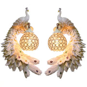 Pair of ornate white gold peacock crystal wall lamps with iridescent feathers and crystal-encrusted globe shades decorbites gold peacock