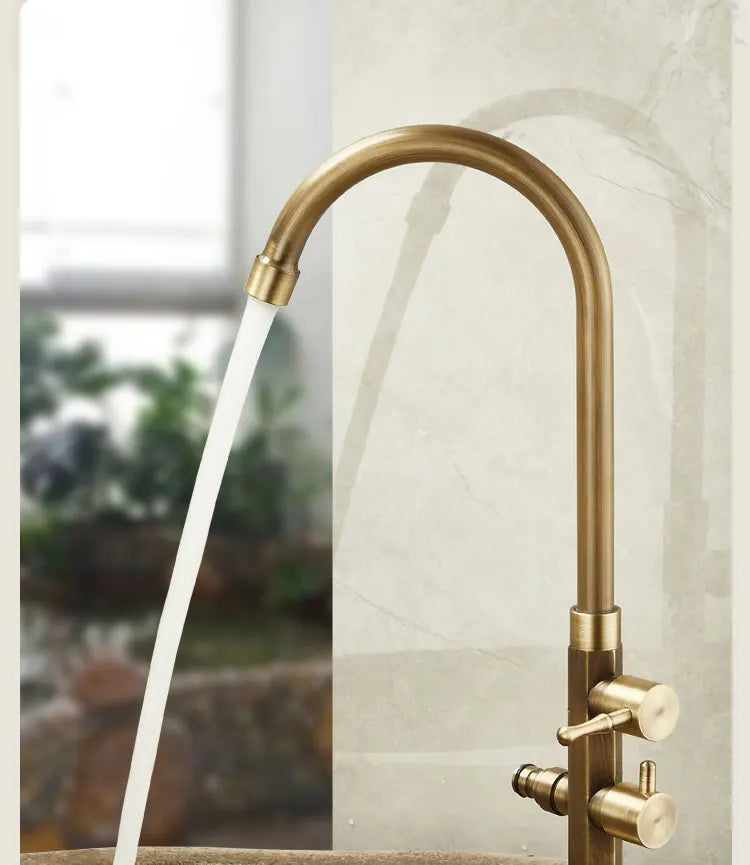 Antique brass single hole gooseneck kitchen faucet with dual control knobs and 360° swivel spout for outdoor use