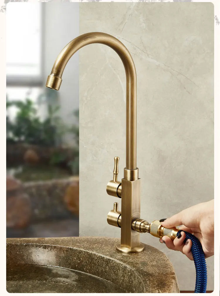 Brass-finished outdoor single hole antifreeze faucet with dual handles and 360° swivel curved spout for balcony use