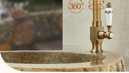 Antique brass outdoor antifreeze single hole faucet with white ceramic handle and black decorative patterns for balcony use