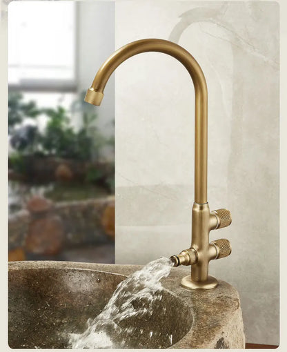 Antique brass single hole outdoor antifreeze kitchen faucet with curved spout and two textured knobs for cold water use
