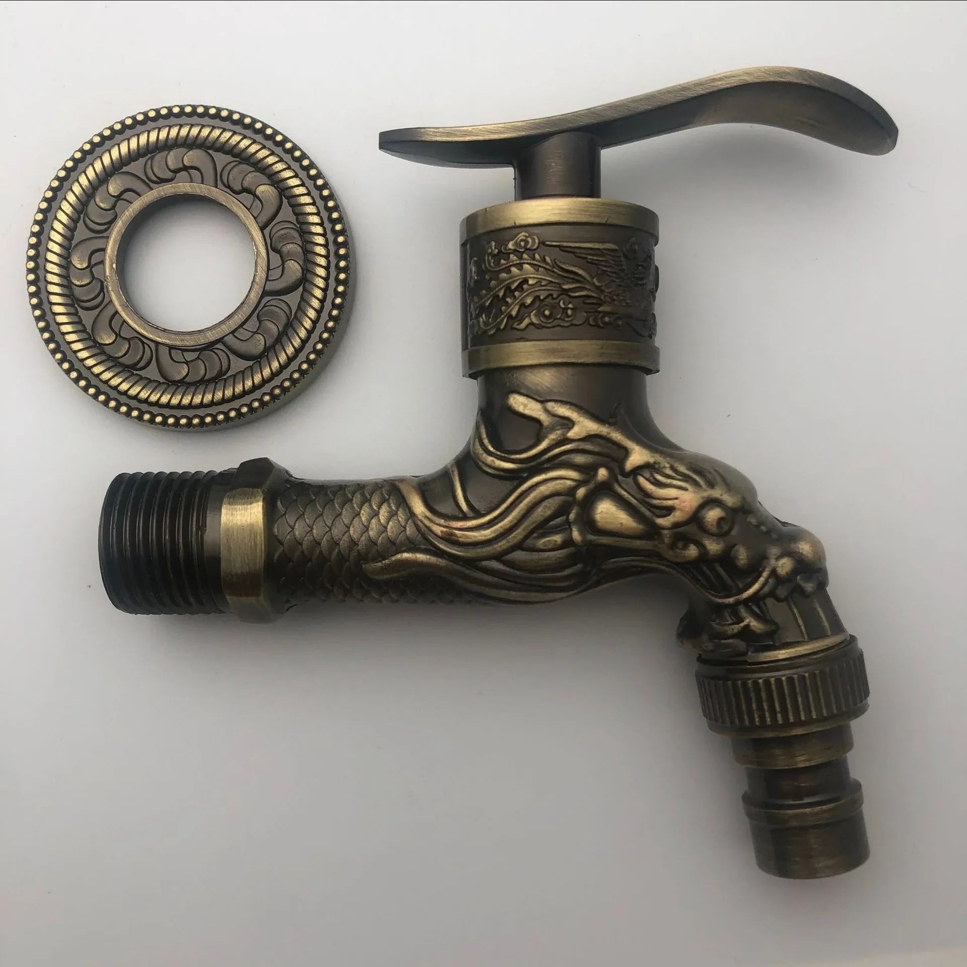 Antique bronze-finished wall mounted outdoor faucet with dragon floral embossing and decorative zinc alloy escutcheon