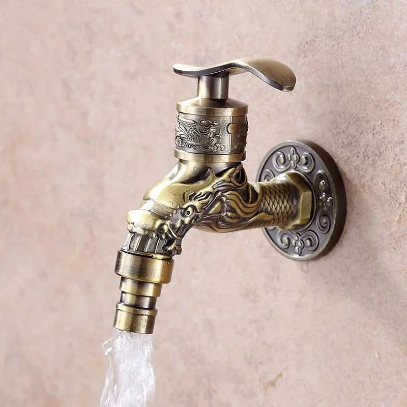 Antique brass wall mounted outdoor faucet with dragon carving, intricate engraving, and vintage zinc alloy finish