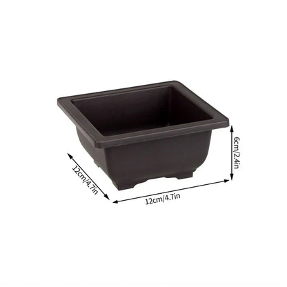 Black rectangular plastic bonsai pot with rounded corners and raised rim for outdoor garden succulent plants pots