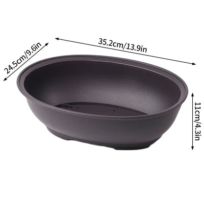 Black oval ceramic bonsai pot with smooth matte finish and subtle rim detailing for succulent plants pots and plants pots