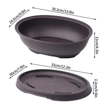 Black oval-shaped ceramic bonsai pot with matching saucer for succulent plants pots and outdoor garden landscape use