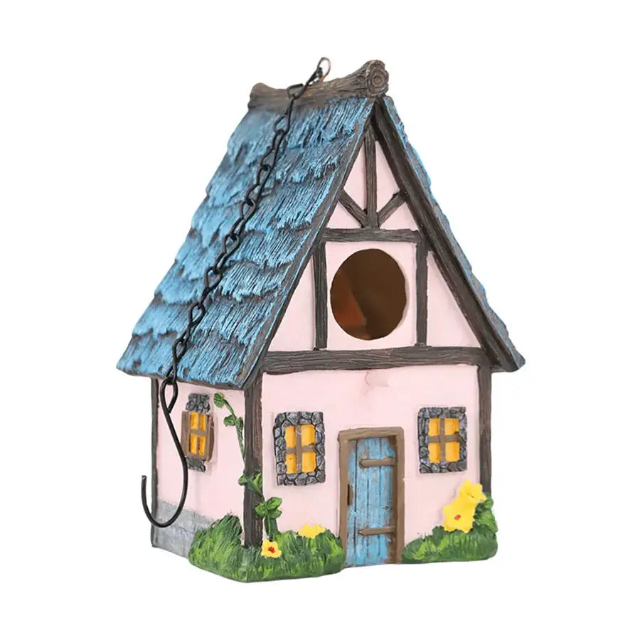 DecorBites™ bird lover’s outdoor hanging resin birdhouse in pink with blue shingled roof and yellow flowers for small birds