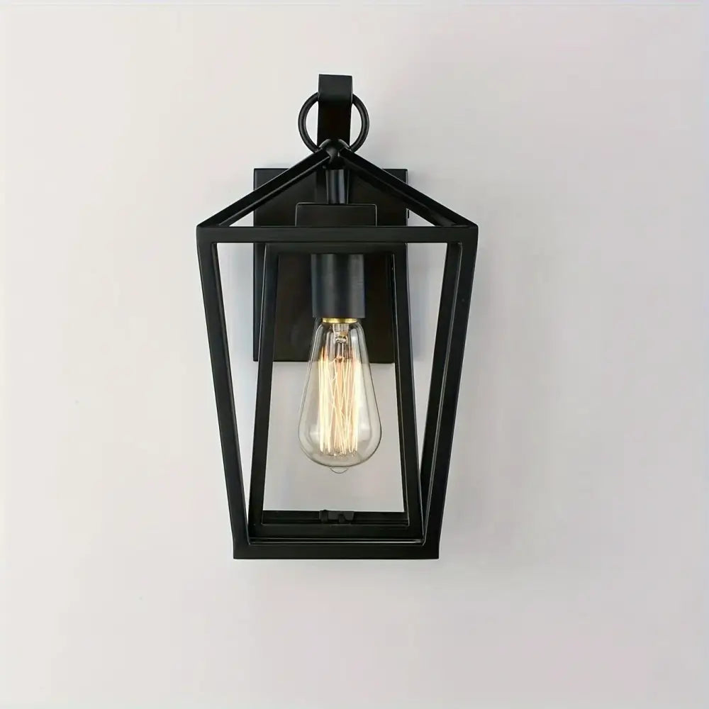 Black metal outdoor wall light with glass shades and exposed filament bulb from DecorBites™ waterproof series