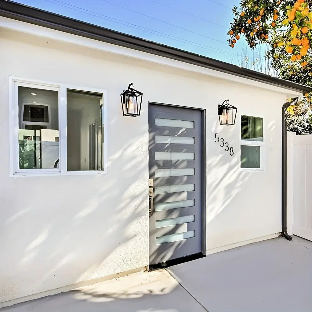 Gray front door with horizontal frosted glass panels illuminated by decorbites waterproof outdoor wall light with glass shades