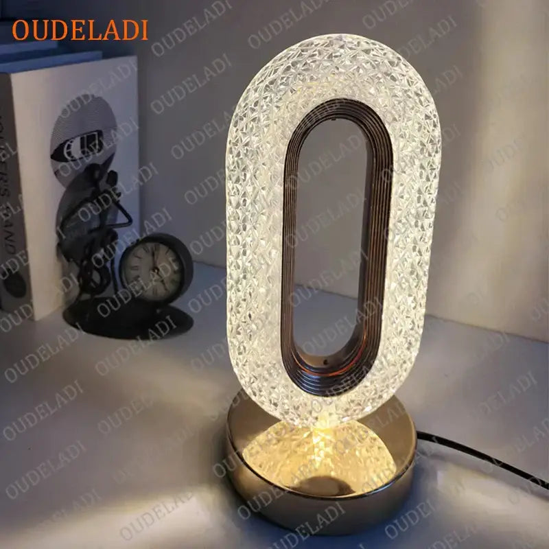 Oval gold crystal bedroom table lamp led atmosphere light with textured exterior and sleek metallic inner frame decorbites crystal bedroom
