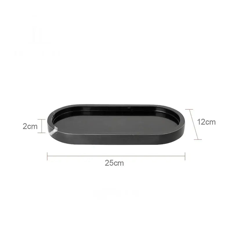 Black oval vanity tray with smooth glossy finish and rounded edges by decorbites calacatta marble for bathroom use