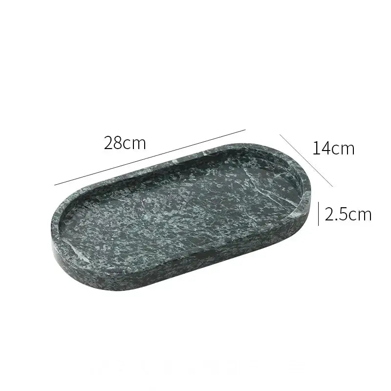 Oval dark green marble vanity tray with smooth polished surface and subtle veining by decorbites calacatta marble