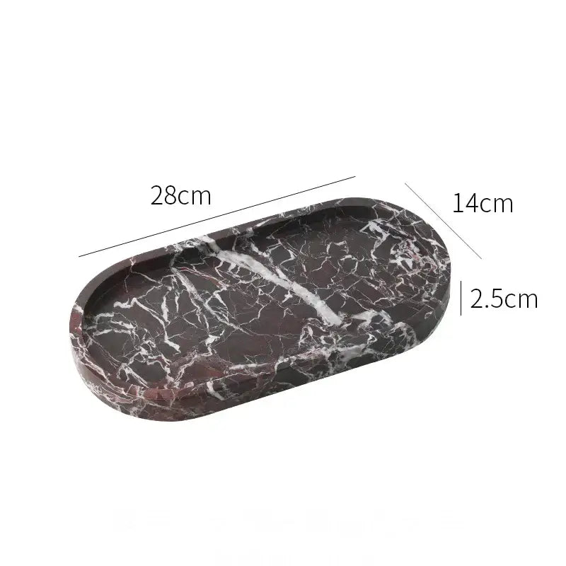 Elegant oval-shaped dark brown calacatta marble vanity tray with white veining measuring 28cm by 14cm decorbites calacatta marble