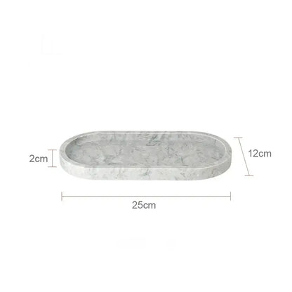Sleek oval white calacatta marble vanity tray with smooth surface and gray veining by decorbites for bathroom decor