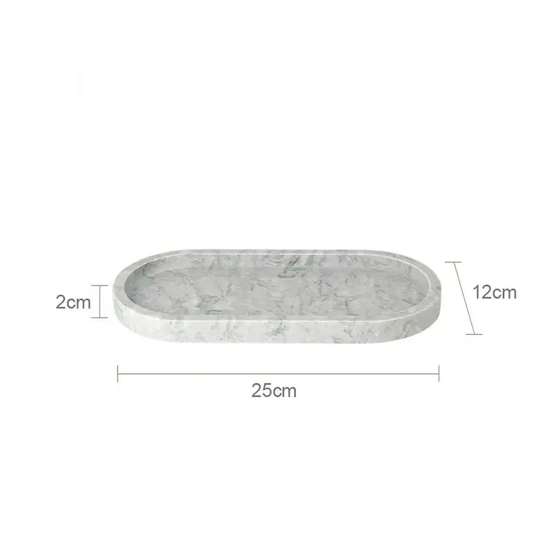 Sleek oval white calacatta marble vanity tray with smooth surface and gray veining by decorbites for bathroom decor