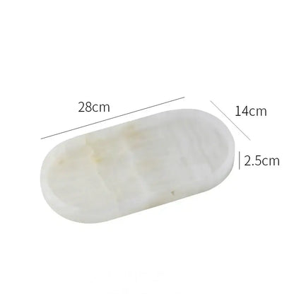 Oval white calacatta marble vanity tray soap dish with smooth oval shape and subtle veining for bathroom use decorbites calacatta marble