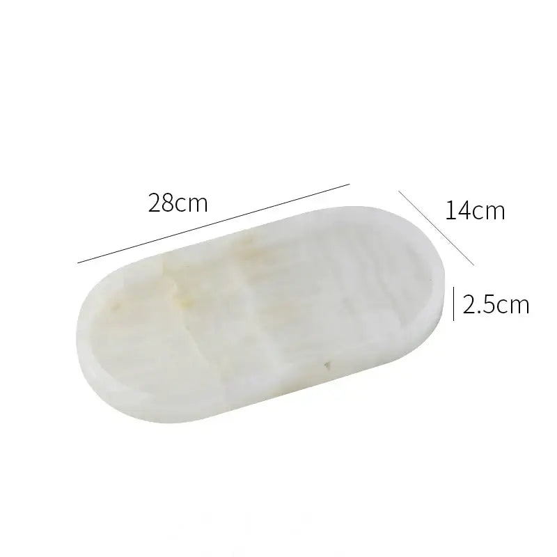 Oval white calacatta marble vanity tray soap dish with smooth oval shape and subtle veining for bathroom use decorbites calacatta marble