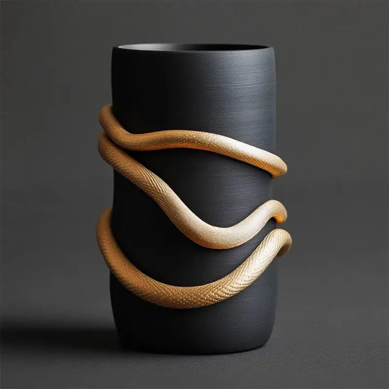 Pagoda black snake pattern tiered box living room decor with black ceramic vase and gold-toned serpentine coils