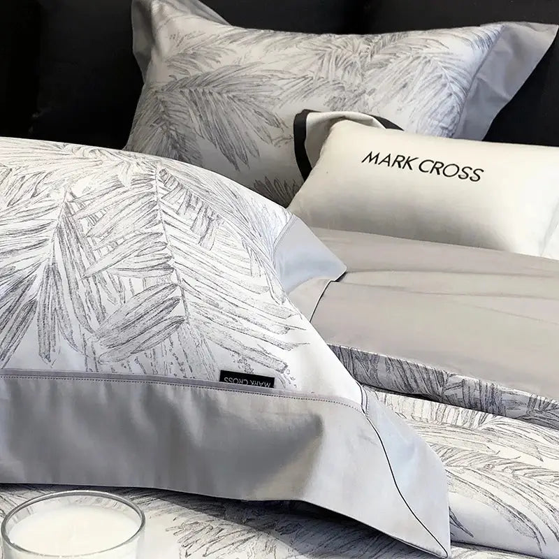 Gray pillow sham with black leaf pattern and satin finish from mark cross in palm leaf egyptian cotton bedding sets