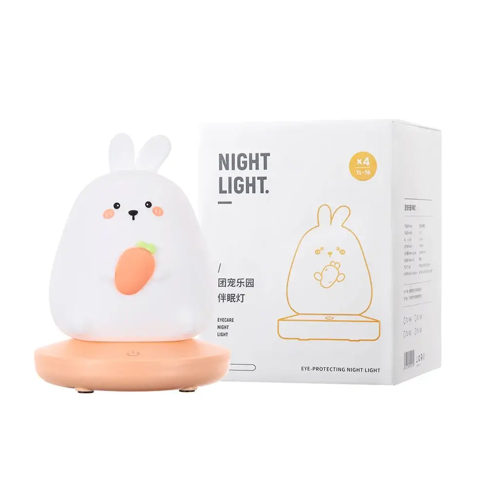 Cute white rabbit-shaped kids animal silicone night light with peach base and orange carrot decorbites kids animal decor