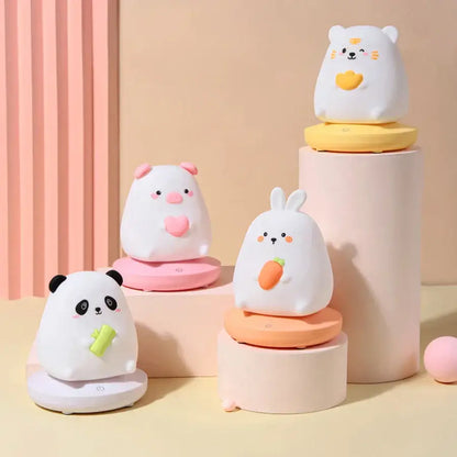 Cute white panda night light in silicone with black accents and playful food-themed decorbites kids animal design