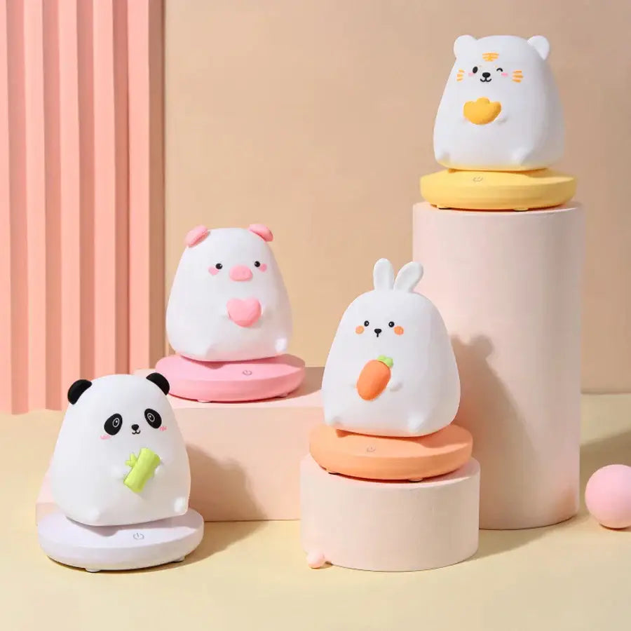 Cute white panda night light in silicone with black accents and playful food-themed decorbites kids animal design