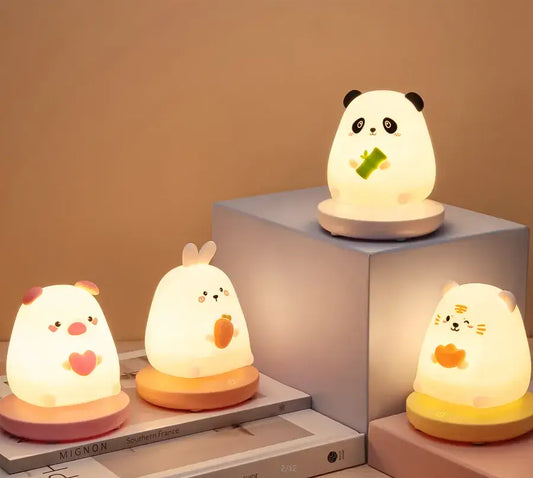 Softly glowing panda white and black kids animal silicone night light holding green bamboo stalk for bedroom decorbites decor