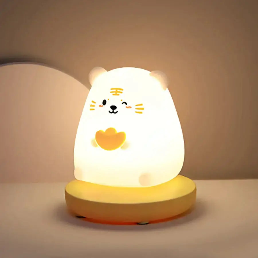 Cute white silicone kids animal night light shaped like a cartoon tiger with yellow accents and heart decorbites kids animal
