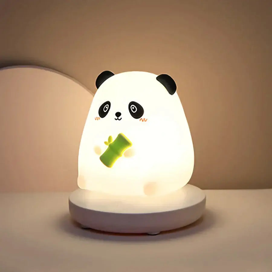 Cute white and black panda-shaped kids animal silicone night light with green bamboo decorbites kids animal design glowing on base