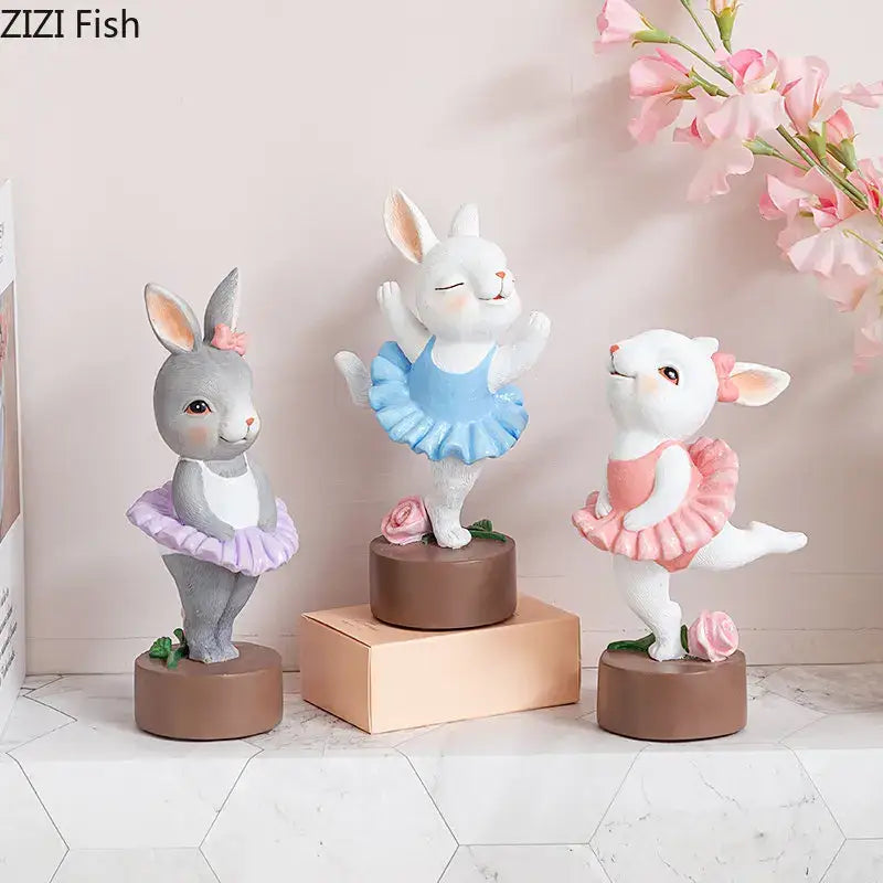Three pastel resin ballet rabbit dancer sculptures in tutus with roses for bedroom desk decor