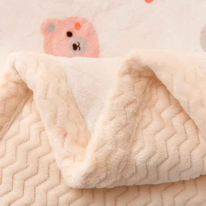 Cream-colored beibei velvet warmth blanket with textured zigzag pattern and cozy fleece interior for bedroom use